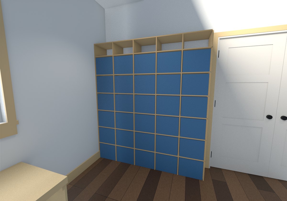 The bookcase filling the wall beside the closet doors: three bays, five rows of books, a plinth matching the room's baseboard