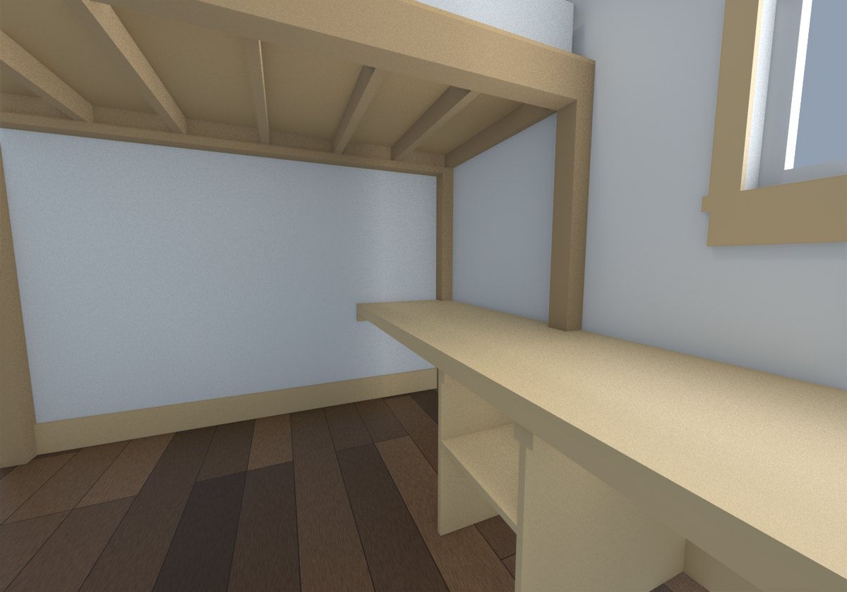 Crouched inside the space beneath the upper loft, looking along the desk toward the west wall
