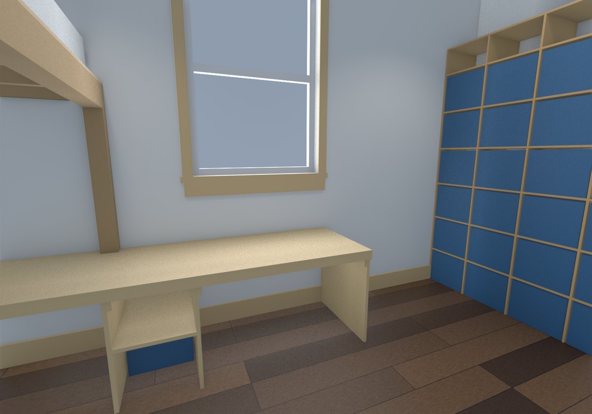 The desk running along the window wall, its open knee bay centred under the window, a crate cubby to the left and the bookcase turning the corner on the right